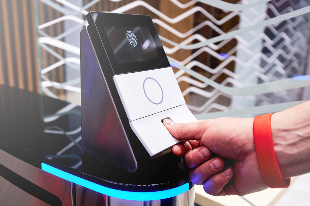 scanning-fingerprint-to-open-security-door-in-private-building-min.jpg